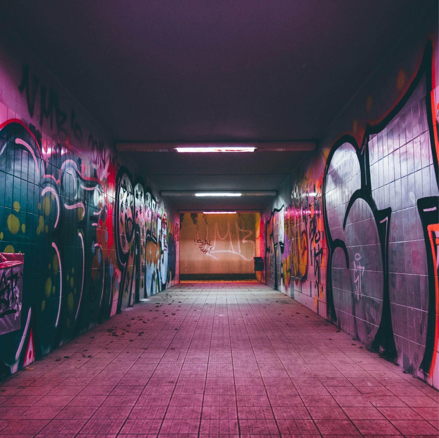 Urban tunnel scene with graffiti – raw city atmosphere and street art details